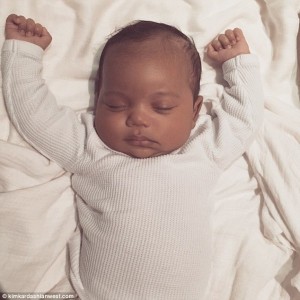 3173012400000578-3458463-The_first_picture_Saint_West_is_seen_sleeping_in_an_image_releas-a-1_1456160449682