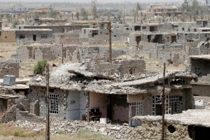 Destroyed buildings from clashes are seen on the outskirt of Falluja