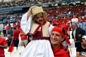 epa05367811 Supporters of Albania cheer prior to the UEFA EURO 2016 group A preliminary round match between France and Albania at Stade Velodrome in Marseille, France, 15 June 2016. (RESTRICTIONS APPLY: For editorial news reporting purposes only. Not used for commercial or marketing purposes without prior written approval of UEFA. Images must appear as still images and must not emulate match action video footage. Photographs published in online publications (whether via the Internet or otherwise) shall have an interval of at least 20 seconds between the posting.) EPA/Tibor Illyes HUNGARY OUT EDITORIAL USE ONLY