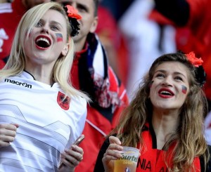 epa05377796 Supporters of Albania cheer prior to the UEFA EURO 2016 group A preliminary round match between Romania and Albania at Stade de Lyon in Lyon, France, 19 June 2016. (RESTRICTIONS APPLY: For editorial news reporting purposes only. Not used for commercial or marketing purposes without prior written approval of UEFA. Images must appear as still images and must not emulate match action video footage. Photographs published in online publications (whether via the Internet or otherwise) shall have an interval of at least 20 seconds between the posting.) EPA/CJ GUNTHER EDITORIAL USE ONLY