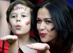 epa05377795 Supporters of Albania cheer prior to the UEFA EURO 2016 group A preliminary round match between Romania and Albania at Stade de Lyon in Lyon, France, 19 June 2016. (RESTRICTIONS APPLY: For editorial news reporting purposes only. Not used for commercial or marketing purposes without prior written approval of UEFA. Images must appear as still images and must not emulate match action video footage. Photographs published in online publications (whether via the Internet or otherwise) shall have an interval of at least 20 seconds between the posting.) EPA/CJ GUNTHER EDITORIAL USE ONLY