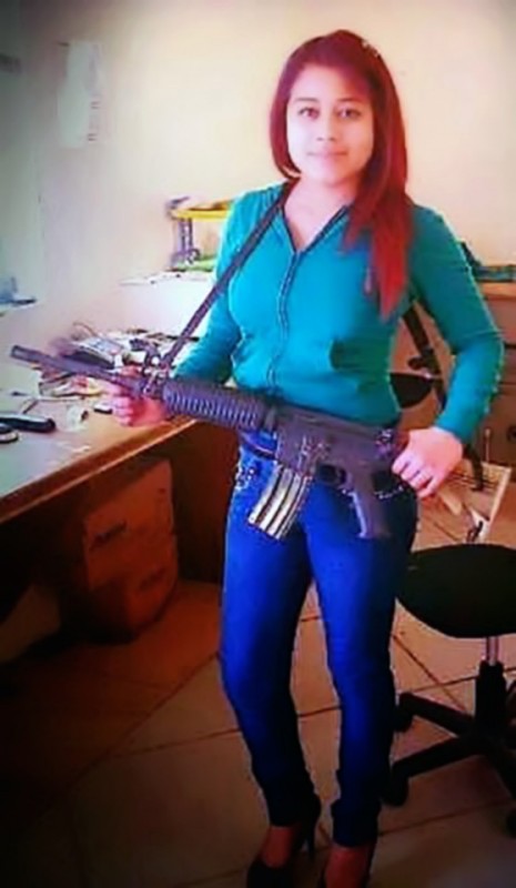 Pic shows: the hitwoman; A Mexican hitwoman has confessed to having had intercourse with beheaded people and drinking their blood. The chilling confession was made by Juana aka La Peque" (The Littleun), who worked for the infamous Zetas cartel in Mexico, and was reported this week in local media. The small but deadly hitwoman made her confessions from one of the prisons of the north-western state of Baja California. She said: "Ever since I was a little girl I was a rebel, and then became a drug addict and alcoholic." She described how she was just 15 when she got pregnant and had a baby with a man 20 years older than her. Juana first worked as a sex worker before becoming a halconeo, a spy who would look out for police or army patrols. She said she would have to stand in position and keep an eye out for trouble for eight hours at a time. If she did it wrong she would be tied up for a week and fed only a taco a day. During her time in the cartel she describes gory moments such as watching how a man's head had been smashed open with a mace. She said: "I remember feeling sad and thinking that I did not want to end up like that." However later on it seems the littleun got used to the blood and even began to revel in it. According to Mexican site denuncias.mx she said she began to "feel excited by it, rubbing myself in it and bathing in it after killing a victim and I even drank it when it was still warm." According to the same source she even insinuated having "had sex with the cadavers of those decapitated, using the severed heads as well as the rest of their bodies to pleasure herself." Juana is still awaiting sentencing.