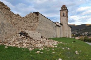 A damaged wall along a church is seen in Norcia, central Italy, October 27, 2016. REUTERS/Emiliano Grillotti