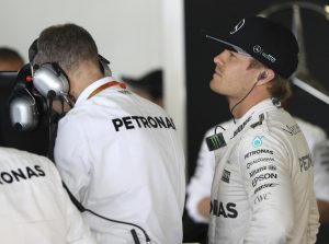 Mercedes driver Nico Rosberg of Germany waits in his team garage during the first practice session for the Japanese Formula One Grand Prix at the Suzuka International Circuit in Suzuka, Japan, Friday, Oct. 7, 2016. (AP Photo/Eugene Hoshiko)