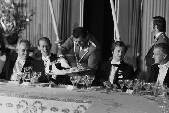 IRAN. Persepolis. At the 2500 th celebration of the Iranian Monarchy, dinner is served under a designer tent. Left to right are Prince RAINIER of Monaco, Prince PHILIP of great Britain, Crown Prince GUSTAV of Sweden and Vice President Spiro AGNEW of the USA.