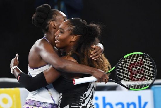 Serena-Williams-of-the-US-R-hugs-Venus