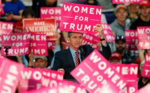 Retired Lt. General Michael Flynn holds up a sign while speaking to the crowd gathered to see US Republican presidential candidate Donald Trump at The Champions Center Expo in Springfield, Ohio, on October 27, 2016. / AFP / Paul Vernon (Photo credit should read PAUL VERNON/AFP/Getty Images)