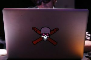 NEW YORK, NY - APRIL 15: A hacker using a laptop computer at the Hacked By Def Con Press Preview during the 2016 Tribeca Film Festival at Spring Studios on April 15, 2016 in New York City. (Photo by Rob Kim/Getty Images for Tribeca Film Festival)