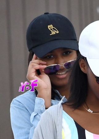 January 13, 2017: ***EXCLUSIVE*** Sasha Obama wears a blue bikini with white stars on it as she relaxes on the beach with friends in Miami. This marks the first time President Barack Obama's daughter has been seen since she skipped her father's farewell speech just days ago. Editorial Rights Managed Image - Please contact www.INSTARimages.com for licensing fee and rights: North America Inquiries: email sales@instarimages.com or call 212.414.0207 - UK Inquiries: email ben@instarimages.com or call + 7715 698 715 - Australia Inquiries: email sarah@instarimages.com.au  or call +02 9660 0500 – for any other Country, please email sales@instarimages.com.  Image or video may not be published in any way that is or might be deemed defamatory, libelous, pornographic, or obscene / Please consult our sales department for any clarification or question you may have - http://www.INSTARimages.com reserves the right to pursue unauthorized users of this image or video. If you are in violation of our intellectual property you may be liable for actual damages, loss of income, and profits you derive from the use of this image or video, and where appropriate, the cost of collection and/or statutory damage.