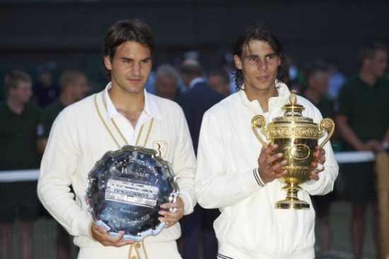 Tennis: Wimbledon: Spain Rafael Nadal victorious with Gentlemen's Singles Trophy and Switzerland Roger Federer with runner-up trophy after Finals match at All England Club. London, England 7/6/2008 CREDIT: Bob Martin (Photo by Bob Martin /Sports Illustrated/Getty Images) (Set Number: X80556 TK13 R2 F26 )