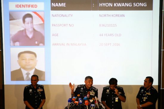 Malaysia's Royal Police Chief Khalid Abu Bakar (C) speaks next to a screen showing North Korean Hyon Kwang Song during a news conference regarding the apparent assassination of Kim Jong Nam, the half-brother of the North Korean leader, at the Malaysian police headquarters in Kuala Lumpur, Malaysia, February 22, 2017. REUTERS/Athit Perawongmetha TPX IMAGES OF THE DAY