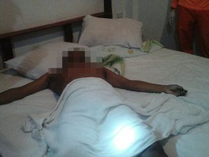 VIRAL PRESS -- COPY-- A 64-year-old man popped sex drugs and died of a heart attack while romping with an escort - who fled leaving him on the bed. The man - named by police as San Gray - booked into the love motel last Thursday night at 7pm before ordering food to eat in the room. A woman was seen on CCTV arriving on a moped at 10pm before leaving a''short time later'' while the man was sprawled naked on the bed in Bueng Kan, northern Thailand. Maids who checked the room at midnight found packets of an aphrodisiac called''the muscle'' and the man's penis was still erect - despite being dead for more than an hour. Police said they believed he had suffered a heart attack while having sex with the young girl due to the power of the drug, or that he had eaten a large meal before having''vigorous activity''. Police Captain Narong Srimart said: "The official opening of the door into the room. The deceased was found lying naked. But his penis was still hard and erect. We believe he had been dead for at least an hour.''He took the aphrodisiac before having sex and had a heart attack during sex. The lady knocked on the door at 10pm but after not long left the room very quickly.'' ENDS (FEE 40 1st pictures, 20 2nd, 15 3rd, 80 unlimited pictures) 07771706292