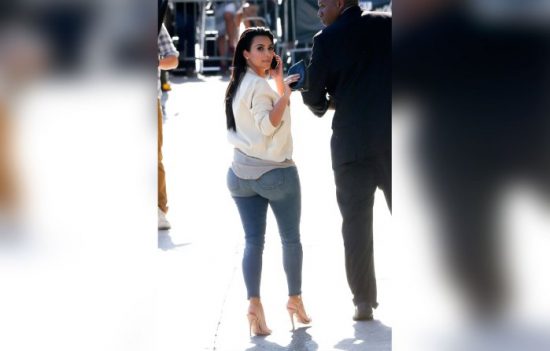 West Hollywood, CA - Kim Kardashian looks casually chic as she makes her way into Jimmy Kimmel Live. She was wearing distressed skinny jeans with a tan shirt, tan bomber jacket, and nude high heel sandals with her hair slicked back. AKM-GSI August 4, 2014 To License These Photos, Please Contact : Steve Ginsburg (310) 505-8447 (323) 423-9397 steve@akmgsi.com sales@akmgsi.com or Maria Buda (917) 242-1505 mbuda@akmgsi.com ginsburgspalyinc@gmail.com