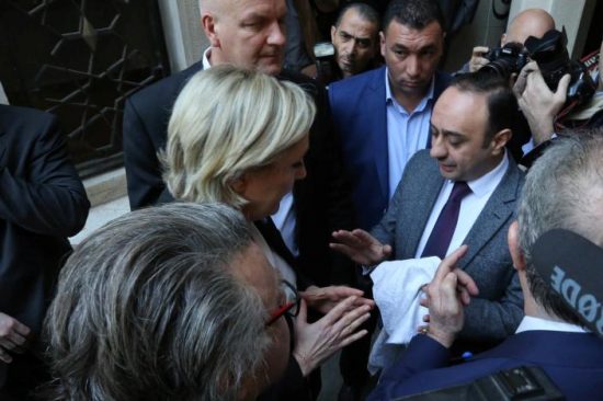 Marine Le Pen, French National Front (FN) political party leader and candidate for French 2017 presidential election, rejects a headscarf for her meeting Lebanon's Grand Mufti Sheikh Abed el-Lateef Daryan in Beirut, Lebanon February 21, 2017. REUTERS/Aziz Taher